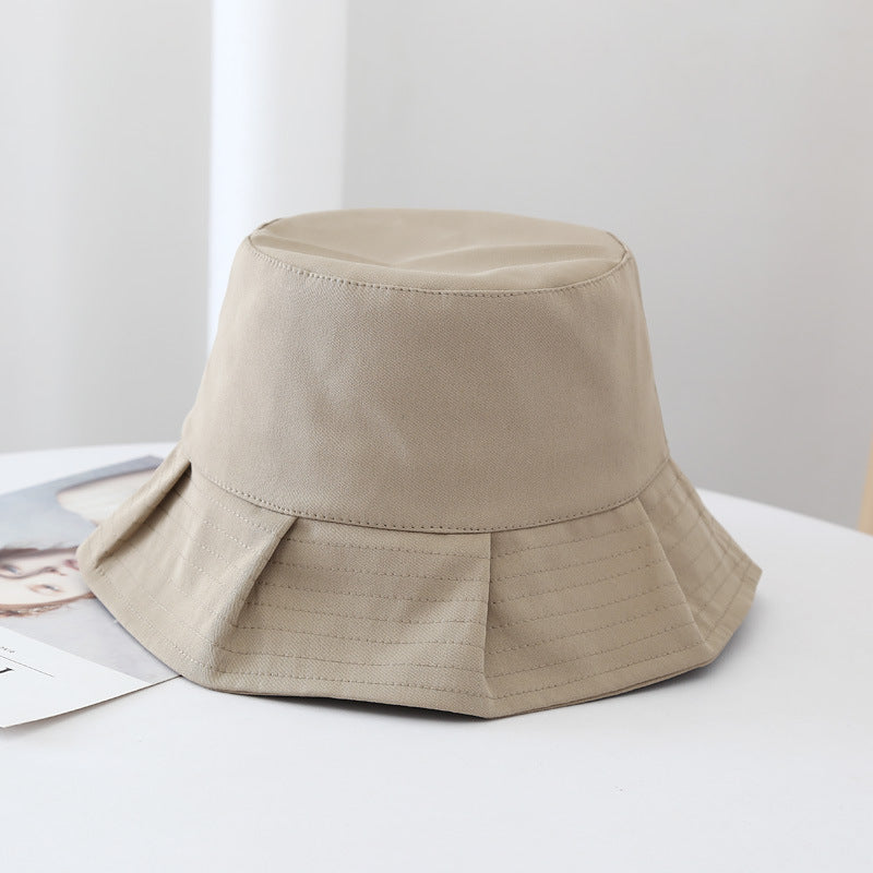 Close-up view of breathable fabric and stitching on trendy beach sun hat