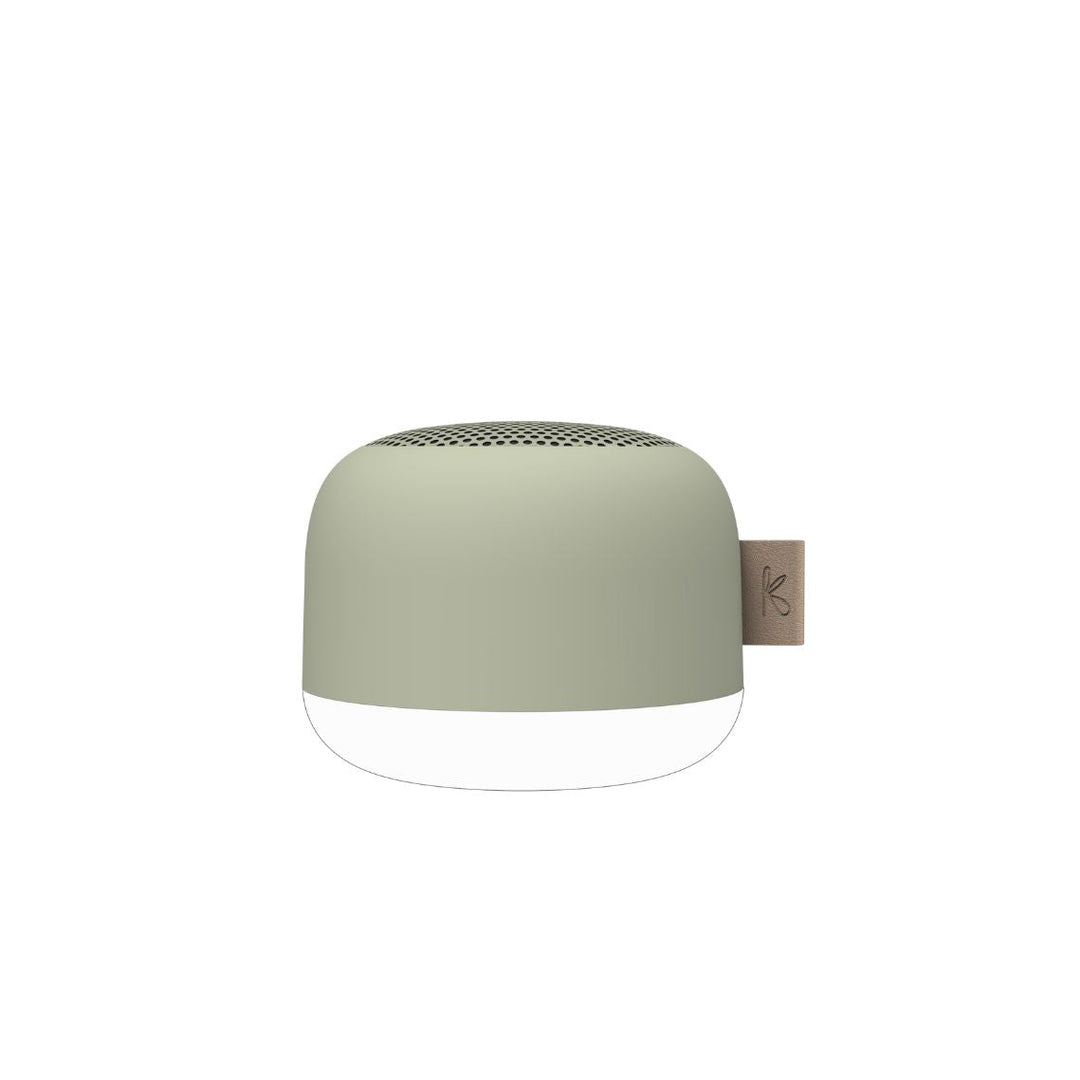 Lifestyle image of waterproof speaker providing relaxing music and light in bath