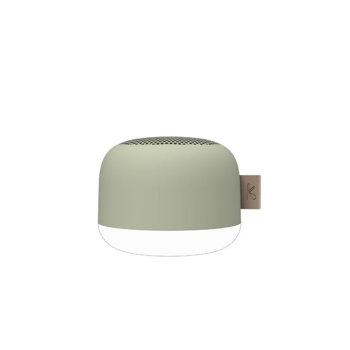 Lifestyle image of waterproof speaker providing relaxing music and light in bath