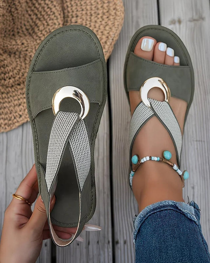 Women's flat sandals in casual slip-on design for comfortable summer wear
