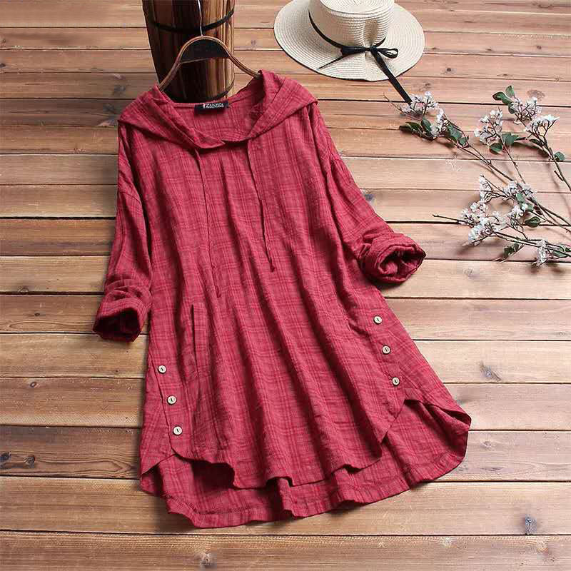 Plus size women's hooded tunic top with long sleeves and button hem in fall fashion style
