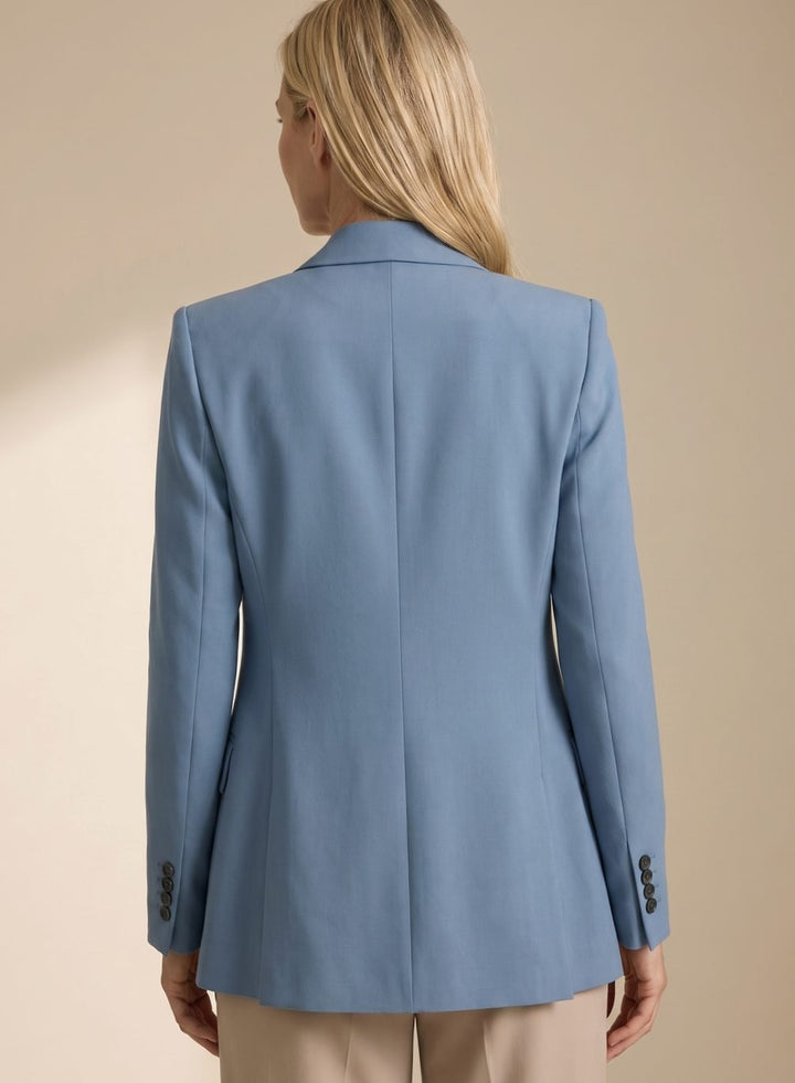 Stylish women's special occasion outfit featuring structured blazer