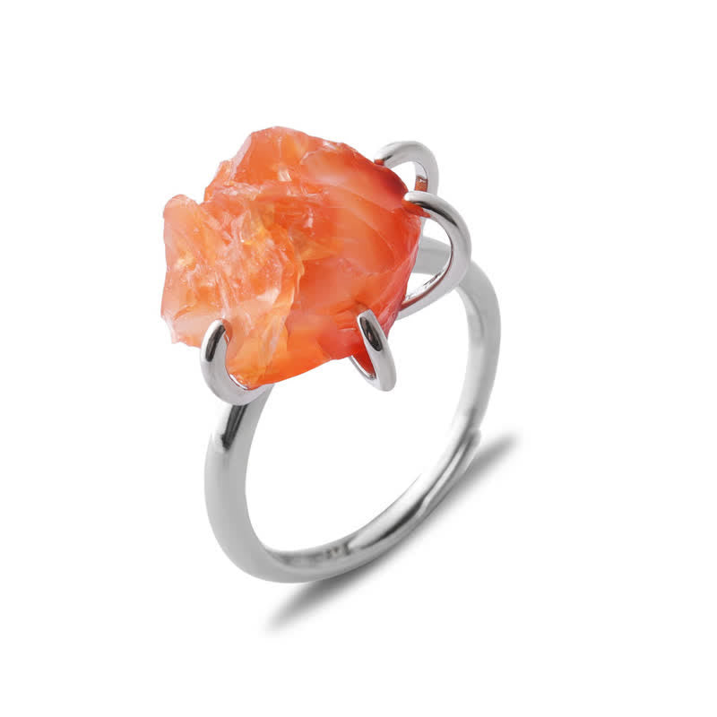 Close up view of raw crystal ring set on adjustable metal band