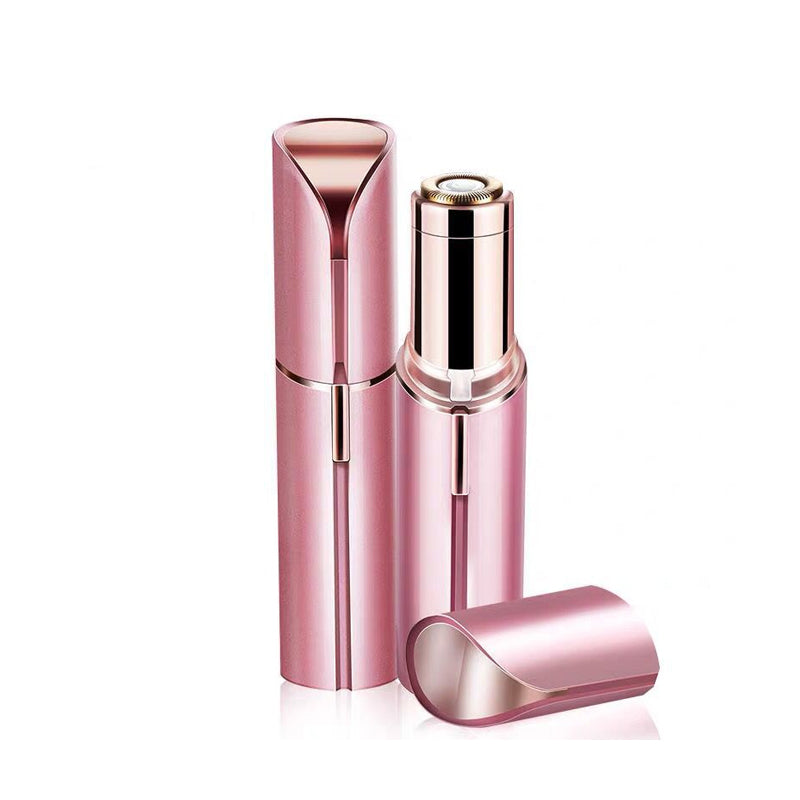 Rose gold facial hair epilator in lipstick design with removed cap