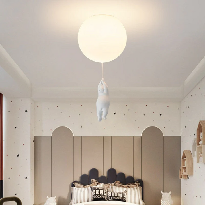 Cartoon lamp ceiling fixture illuminating a playful children bedroom