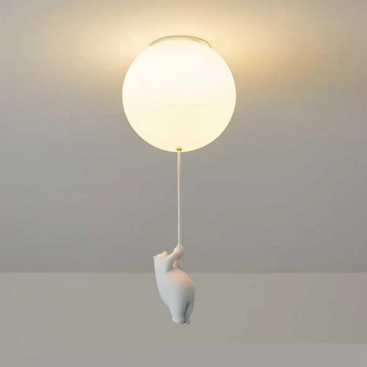 Illuminated bear balloon ceiling light mounted on a neutral ceiling