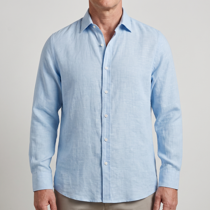 Man wearing light blue long sleeve casual button-down shirt