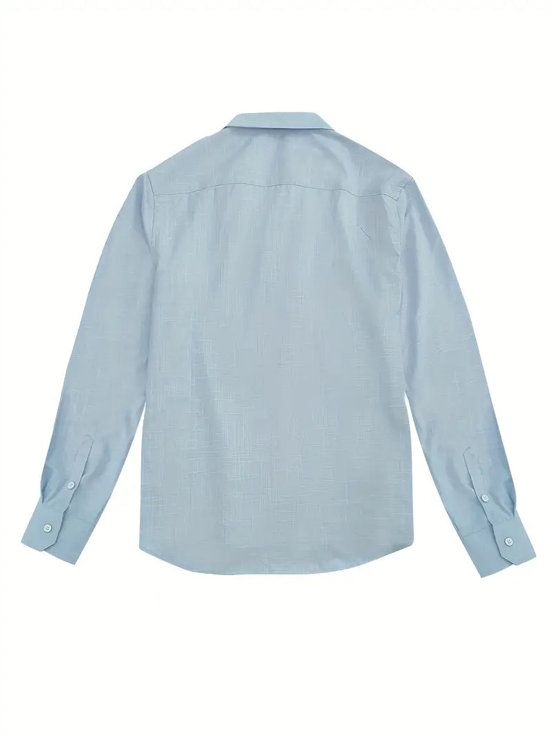 Folded mens tailored shirt displaying neat presentation and fabric quality