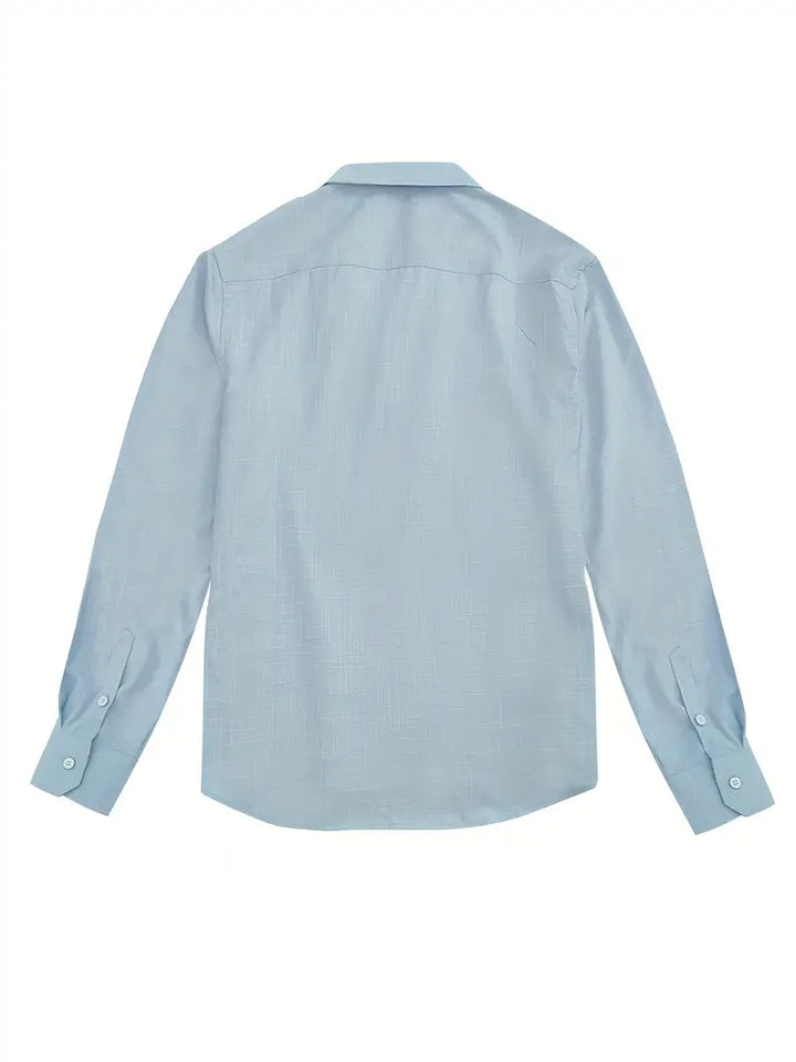 Folded mens tailored shirt displaying neat presentation and fabric quality