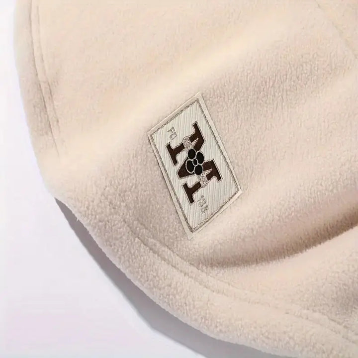 Person wearing the windproof cycling mask hat outdoors in winter