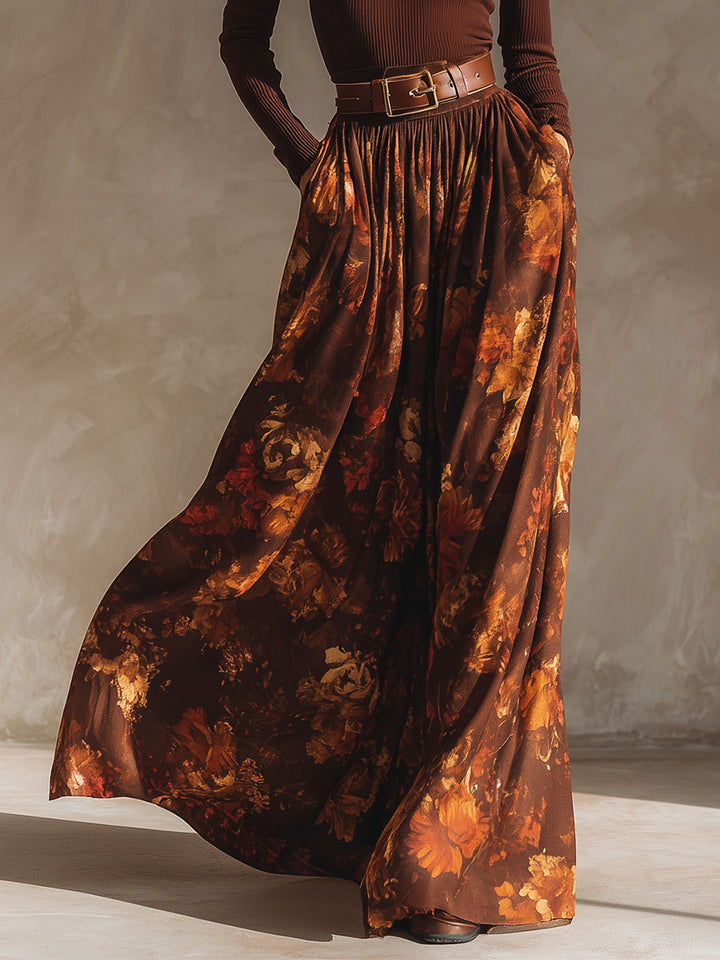 Detailed view of the flowing printed long skirt and matching belt