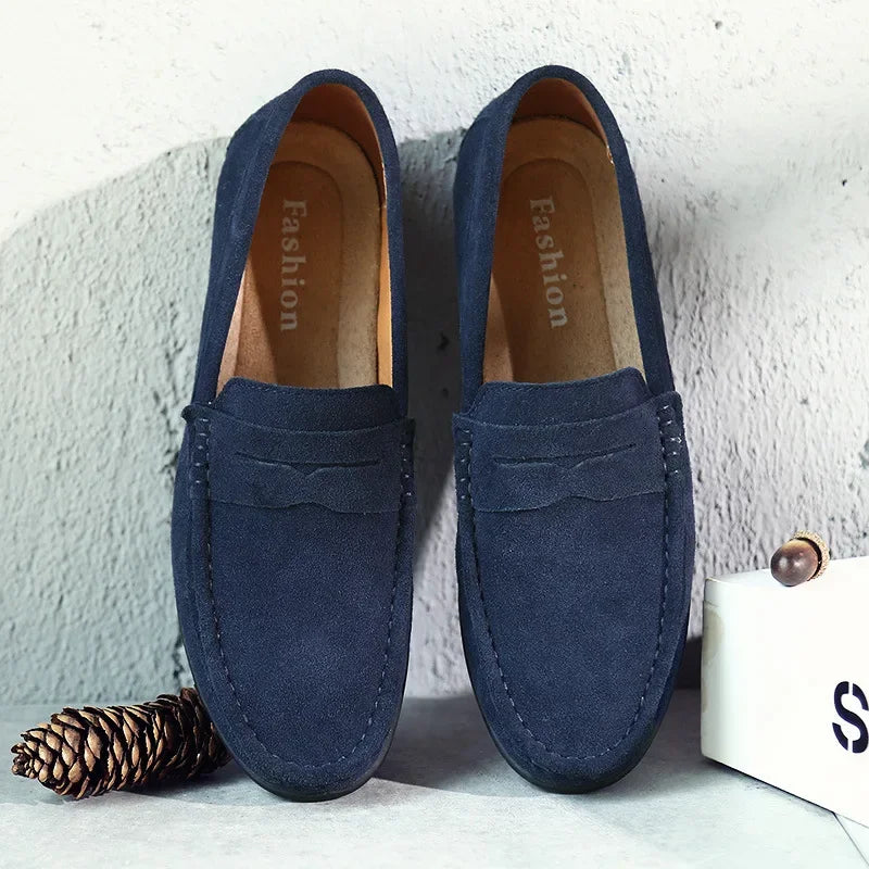 Side profile of smart casual penny loafers for men, showcasing the sleek silhouette, premium stitching, and easy slip-on cons