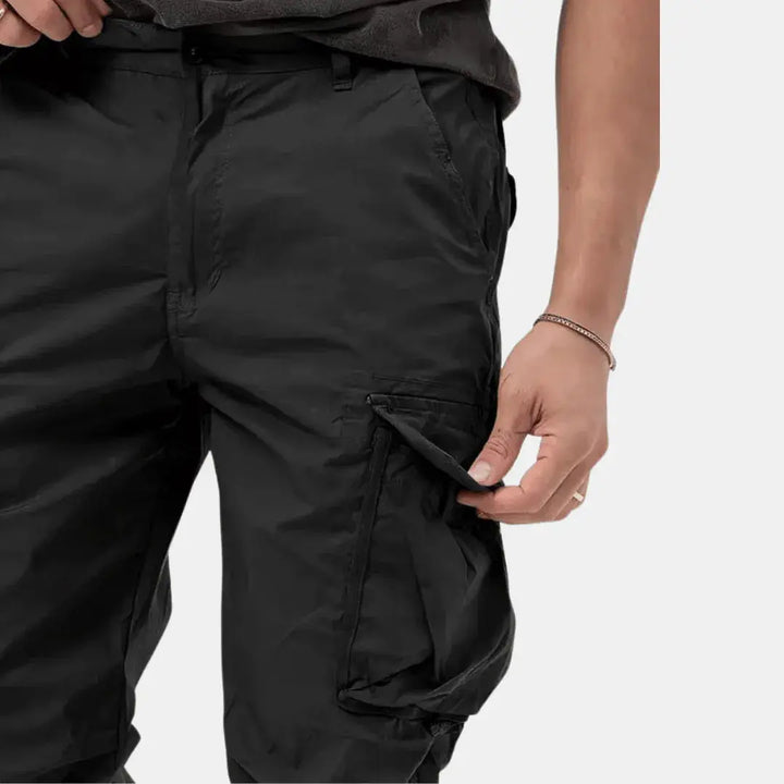 Close-up of elastic waistband and adjustable drawstring on casual trousers