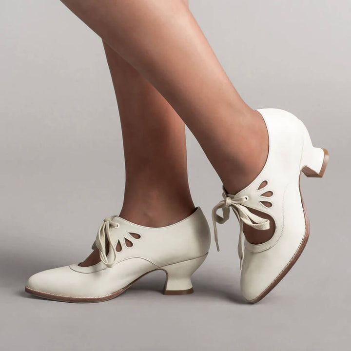 Side profile of women's low heel dress shoes showcasing ergonomic design and cushioned insoles.