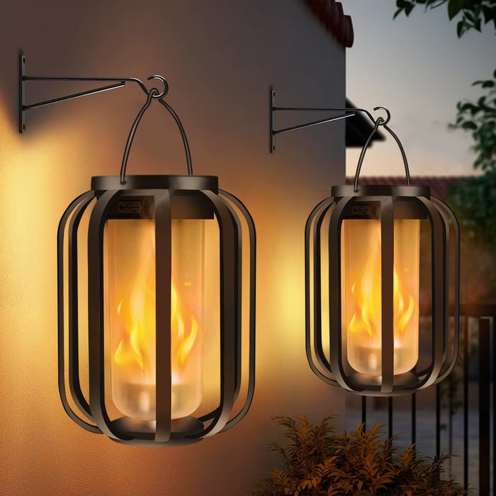 FlameGlow solar lantern hanging on an outdoor wall bracket showing realistic flame effect