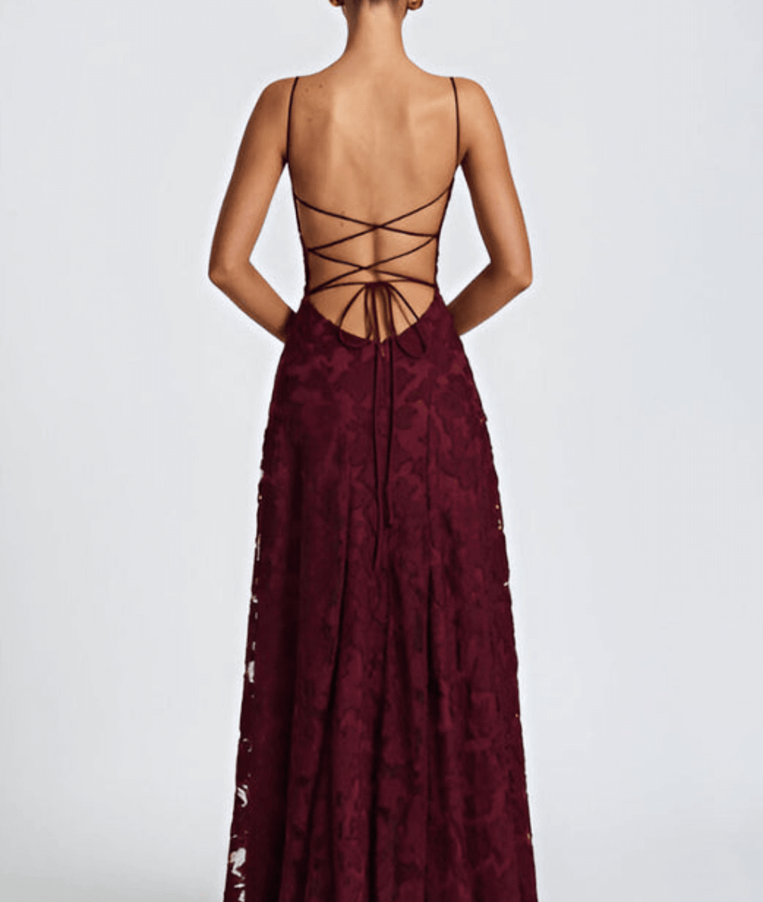 Full view of women's floral maxi dress featuring elegant spaghetti straps