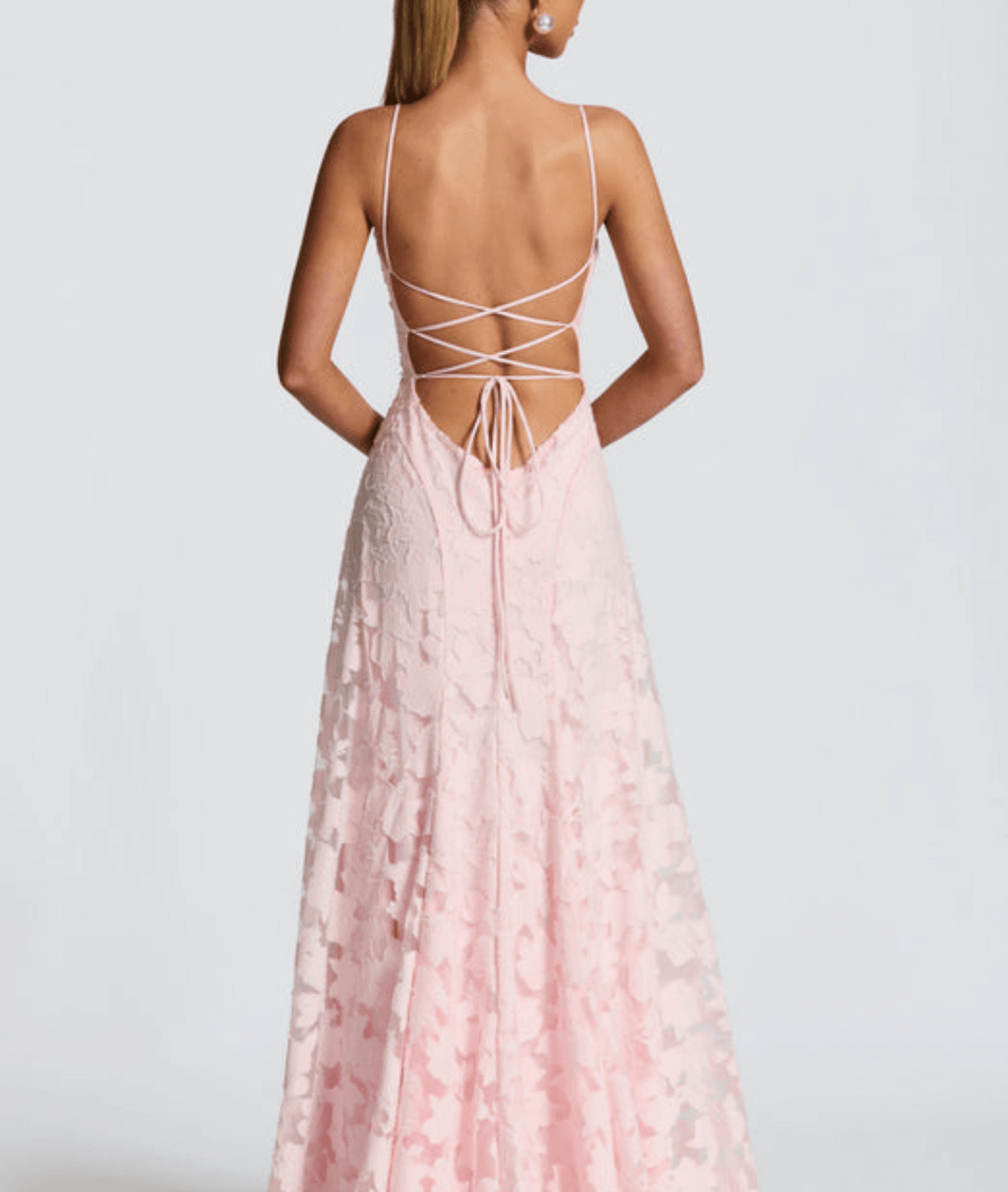 Side angle of flowy floral evening dress suitable for formal wear