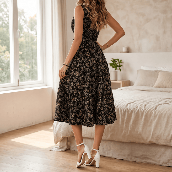 Lifestyle shot of womens floral print smocked midi dress