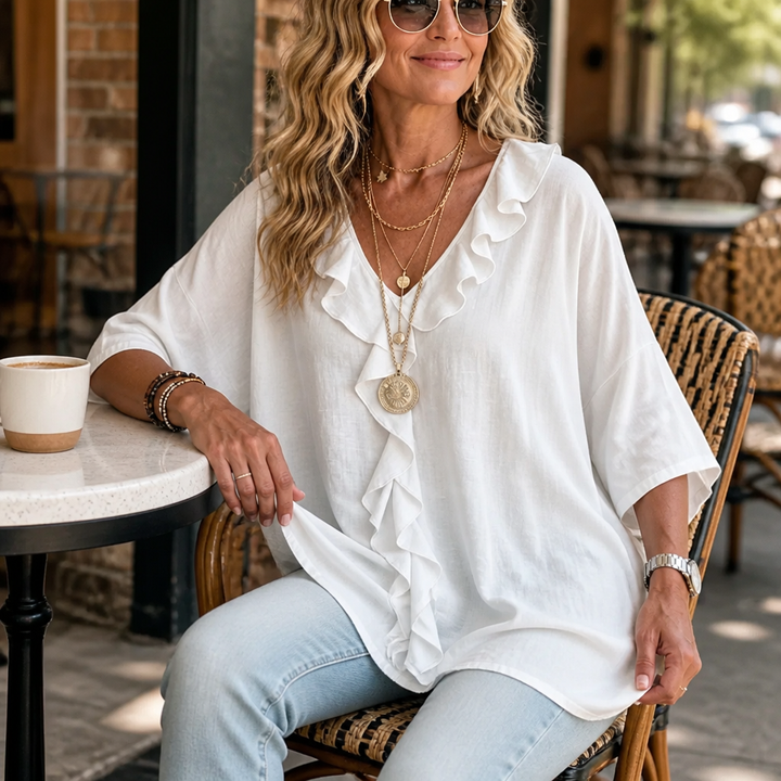 Women's boho ruffle V-neck blouse, front view showing oversized casual fit