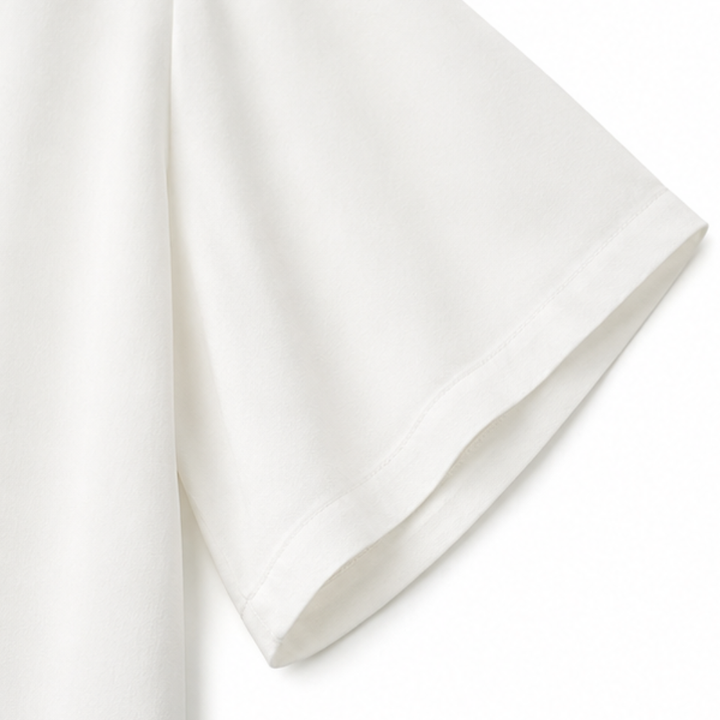 Flat lay of the women's boho V-neck blouse styled for casual wear