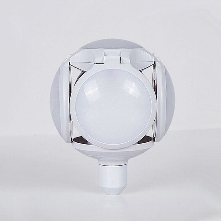 Foldable white solar LED camping bulb shown closed and upright