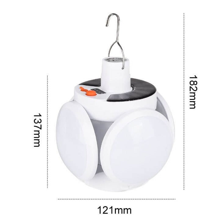 Versatile solar bulb and hiking gear glowing brightly in a dark room