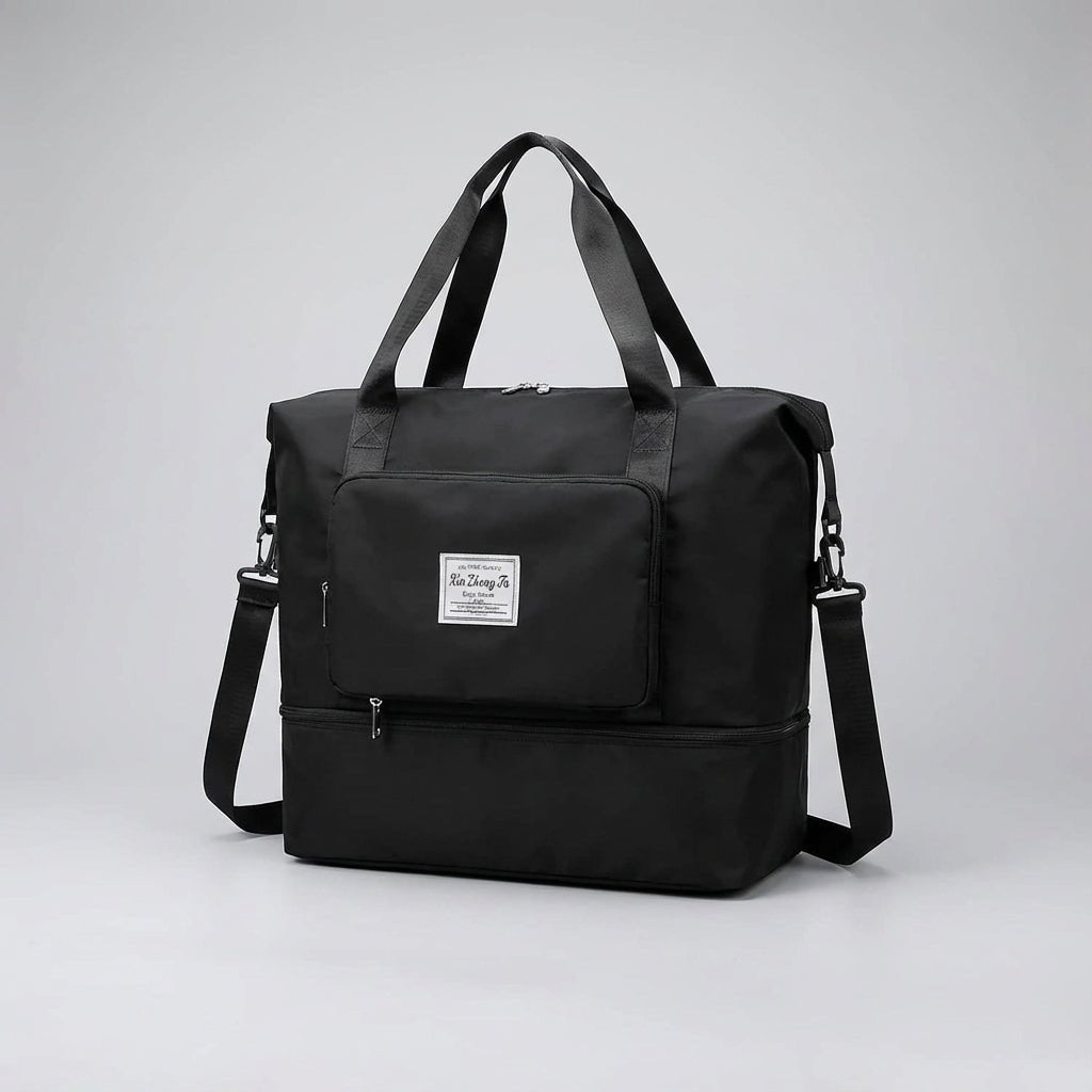 Black foldable travel bag with expandable capacity and front zip pocket