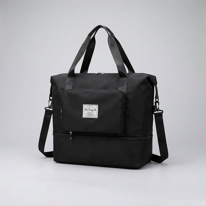 Black foldable travel bag with expandable capacity and front zip pocket