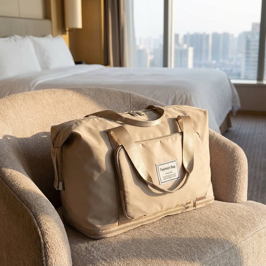 Beige travel bag placed on an armchair in a hotel room setting