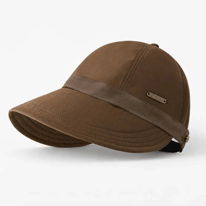 Brown foldable wide-brim sun hat showcasing its structured crown and curved brim