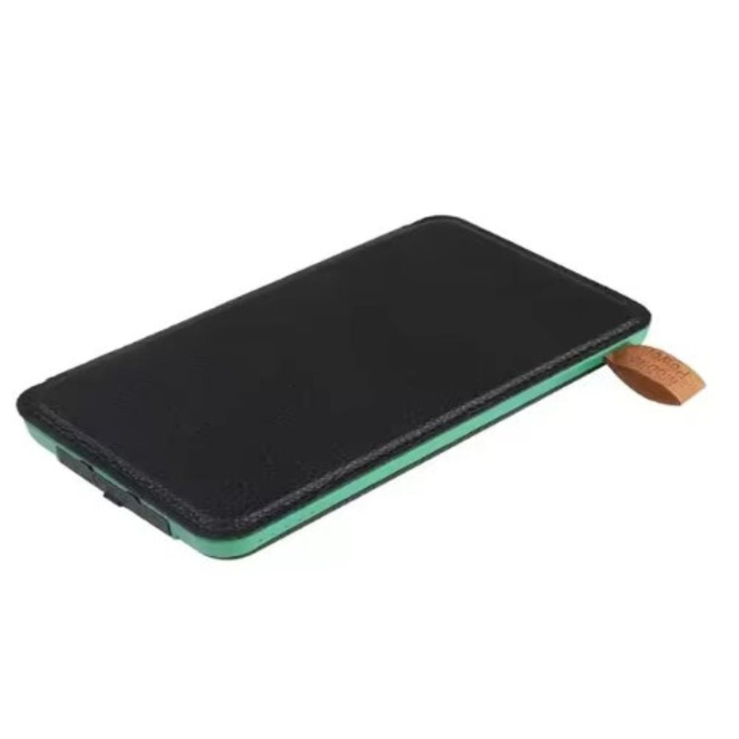 Portable folding solar power bank showing built-in charging cables