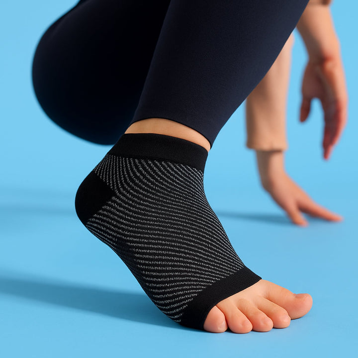 Open toe ankle compression sleeve worn on foot for daily support