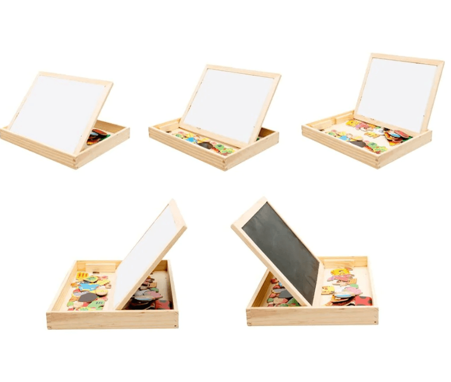 Children using the magnetic drawing board and educational toy in a playroom