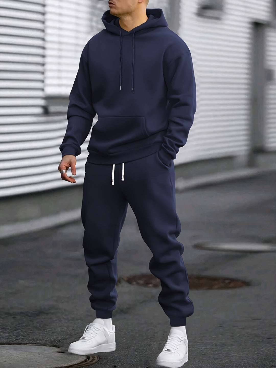 Mens sports set hoodie and jogging bottoms in casual wear style