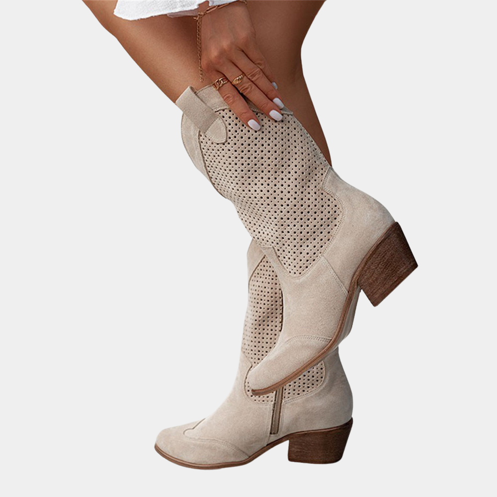 Cowgirl ankle boots featuring stylish perforated cutout design