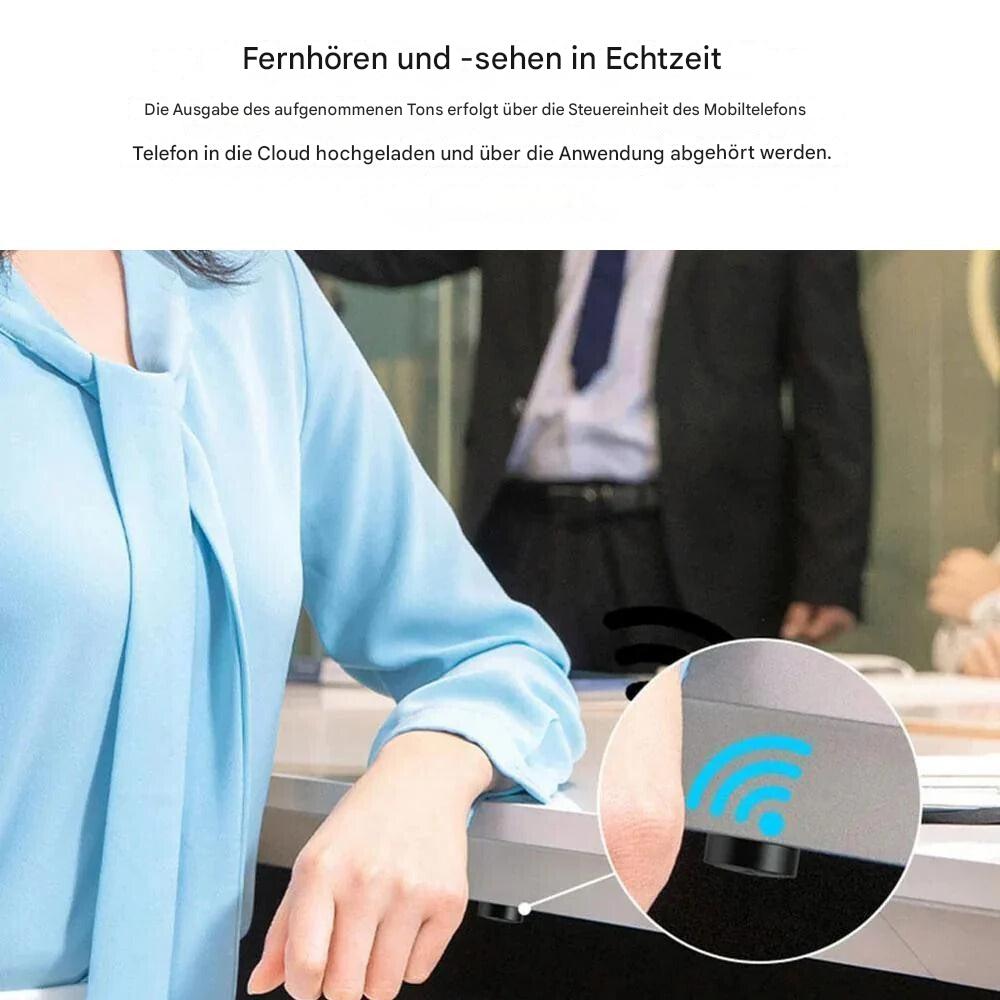 Vehicle tracker and magnetic locator held in a hand to demonstrate its compact size.