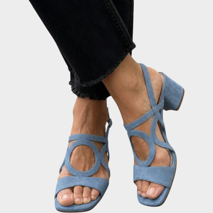 Side view of womens dress sandals with sturdy block heel