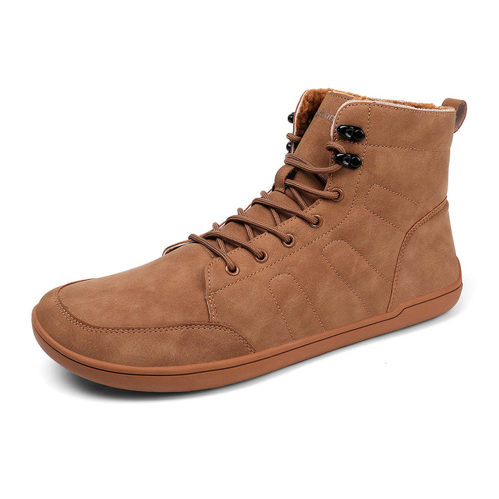 Water-resistant minimalist boots paired with winter outfit