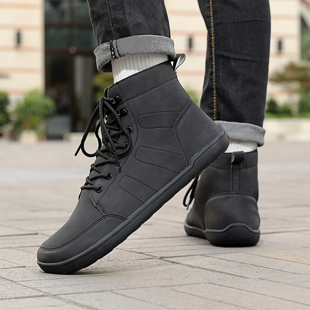 Water-resistant casual footwear featuring a flexible barefoot sole