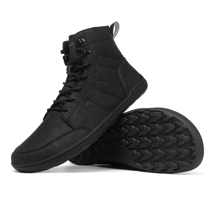 Black water-resistant barefoot winter boot featuring lace-up design