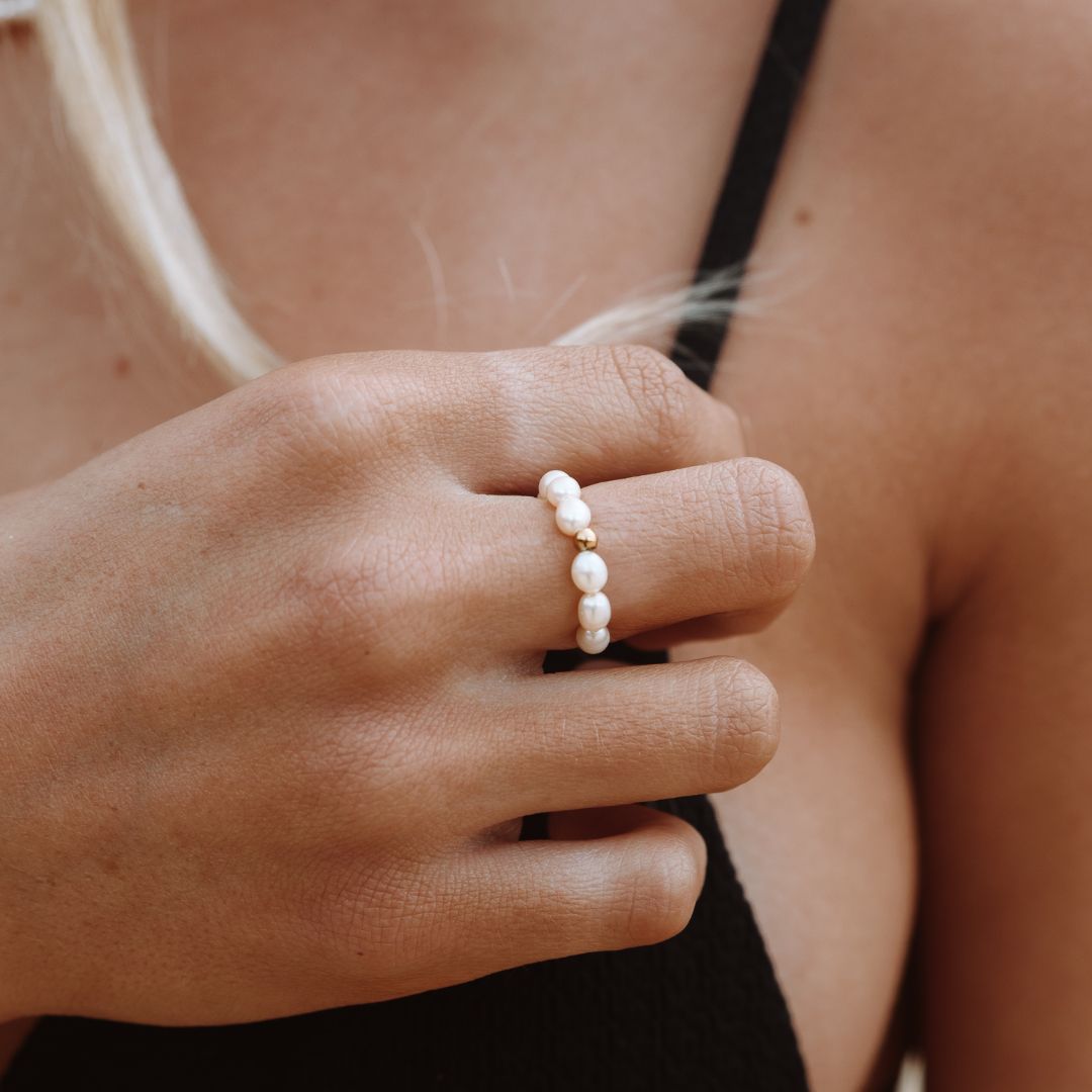 Elegant natural pearl ring styled on a woman's hand