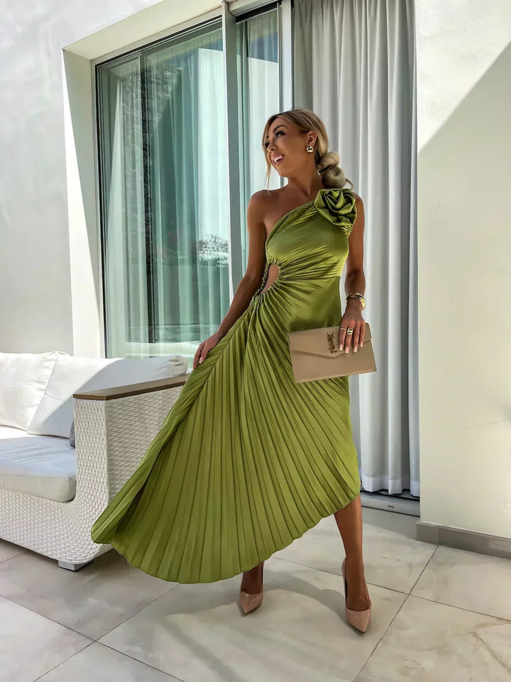 Side view of elegant womens floral dress with pleated details