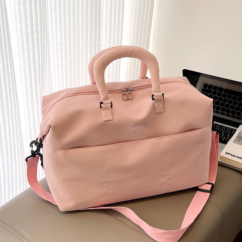 Spacious interior of the weekend bag and gym bag with multiple storage compartments