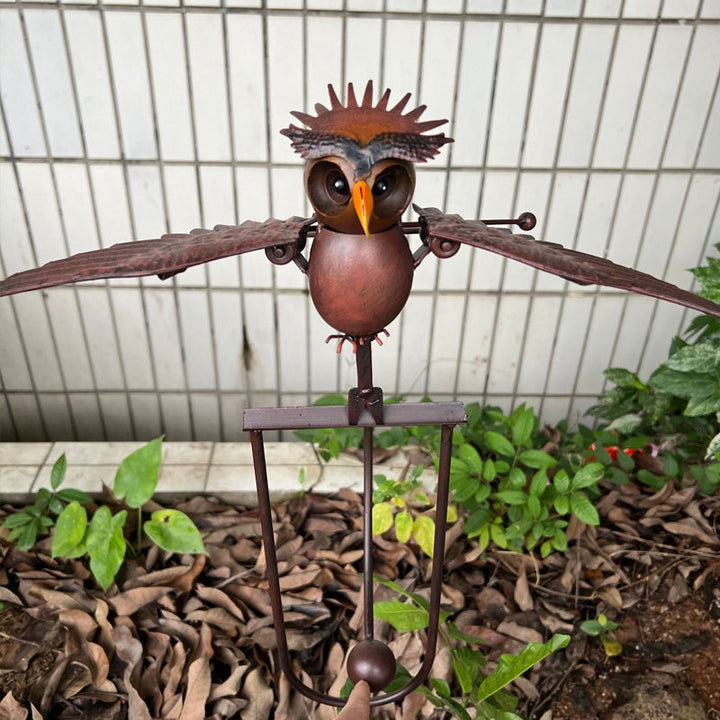 Outdoor kinetic wind spinner with bird garden art design