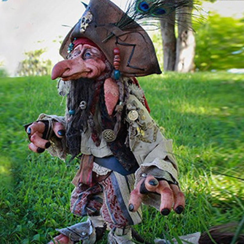 Pirate styled large garden goblin sculpture variant C on lawn