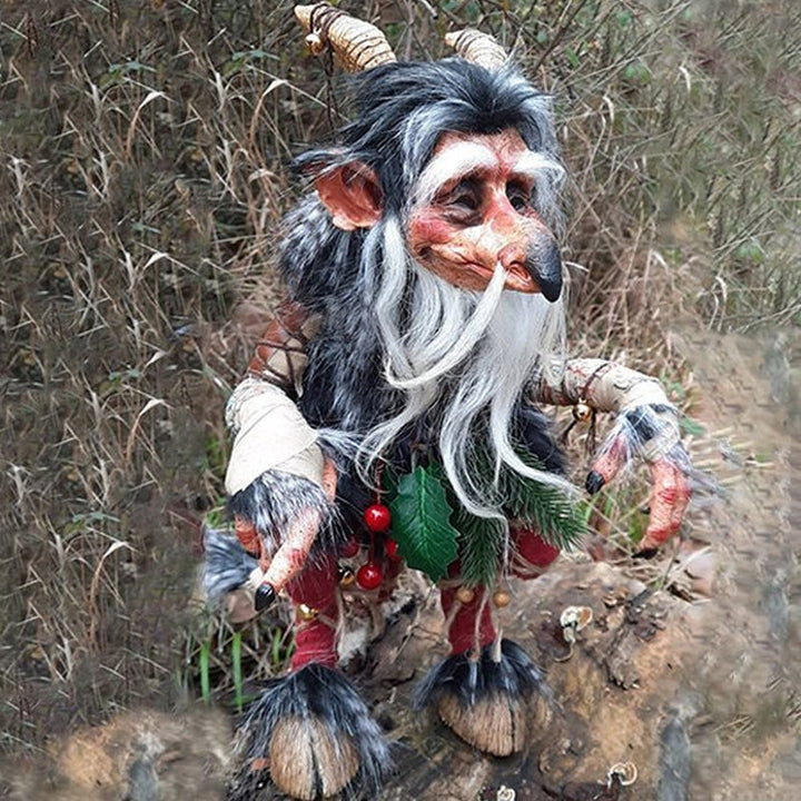 Unique garden sculpture goblin statue acting as fun outdoor decor