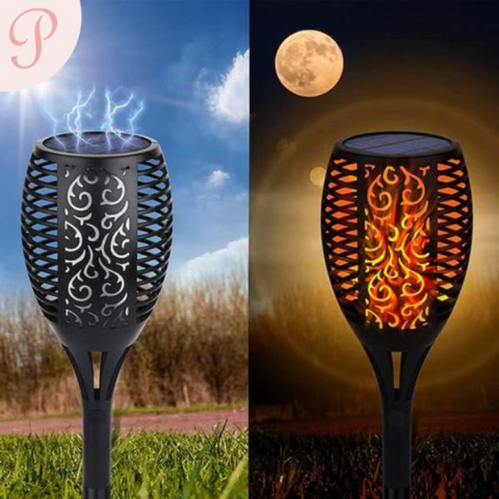 Close up of solar torch light charging in daylight and glowing at night