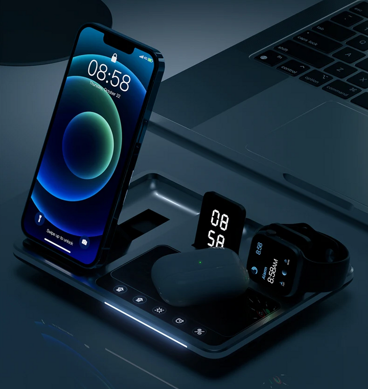 Universal 4-in-1 fast wireless charging station powering multiple tech accessories on a clean desk