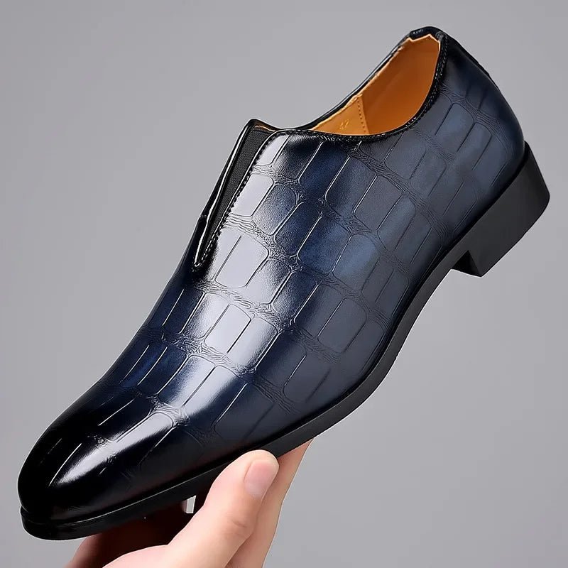 Angle shot of men's formal footwear showcasing polished leather and stitching details.