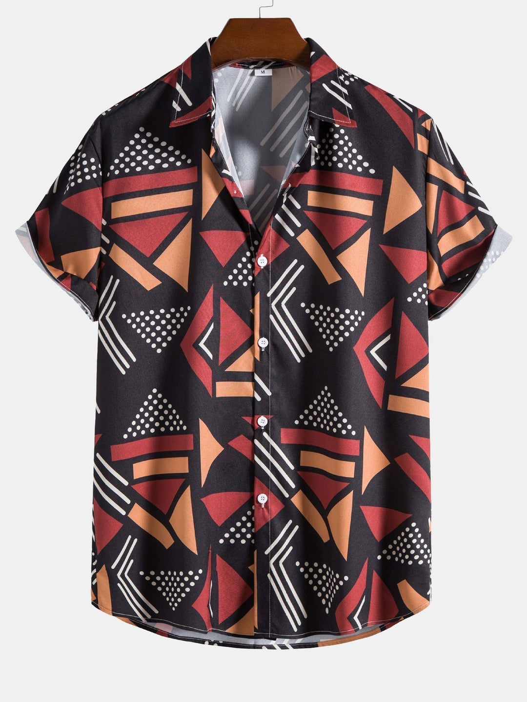 Close-up view of the black and navy geometric pattern on men's swimwear set